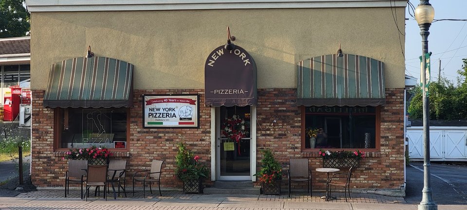 Pizza shop storefront on West Main Street